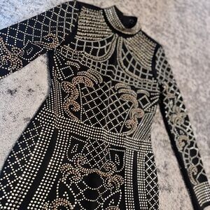 Elegant Black and Gold Embellished Dress